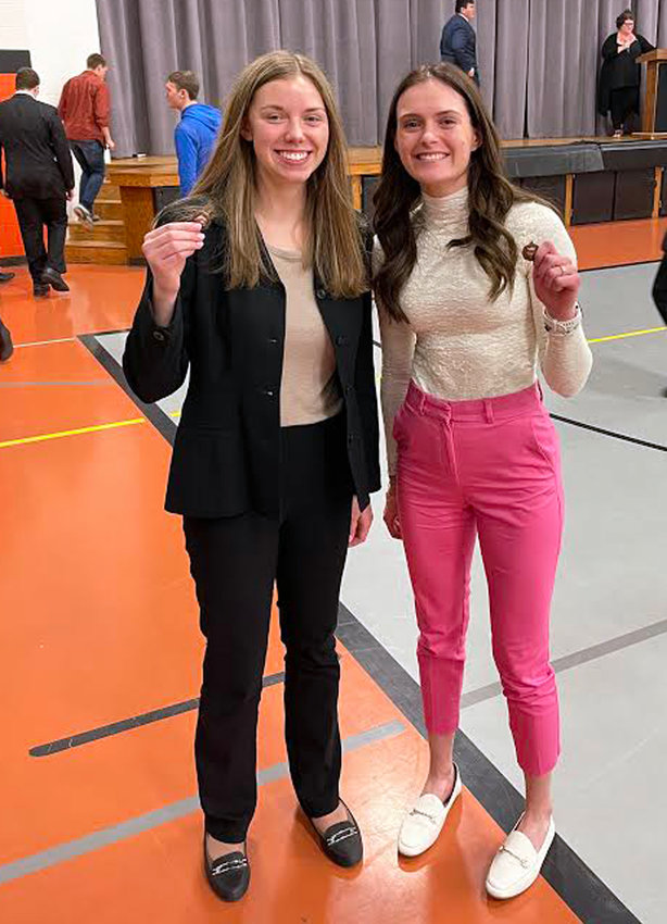 April Klein, left, and Keelianne Green were two of nine finalists during a speech competition at North Bend High School Saturday.