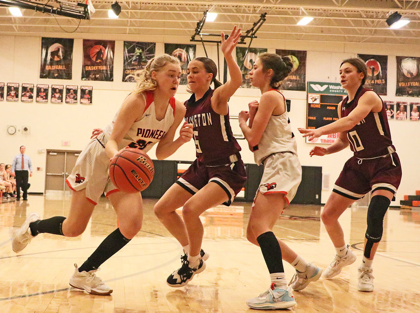 The Pioneers' Maelie Nelson, left, and Ella Bouwman, third from left, play 2-on-2 with Arlington's Emme Timm, second from left, and Hailey O'Daniel on Tuesday at Fort Calhoun High School.