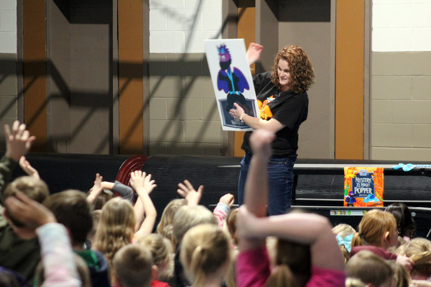Mary Kuhlmann of the American Heart Association kicks off the Kids Heart Challenge with Arlington Elementary School Wednesday afternoon.