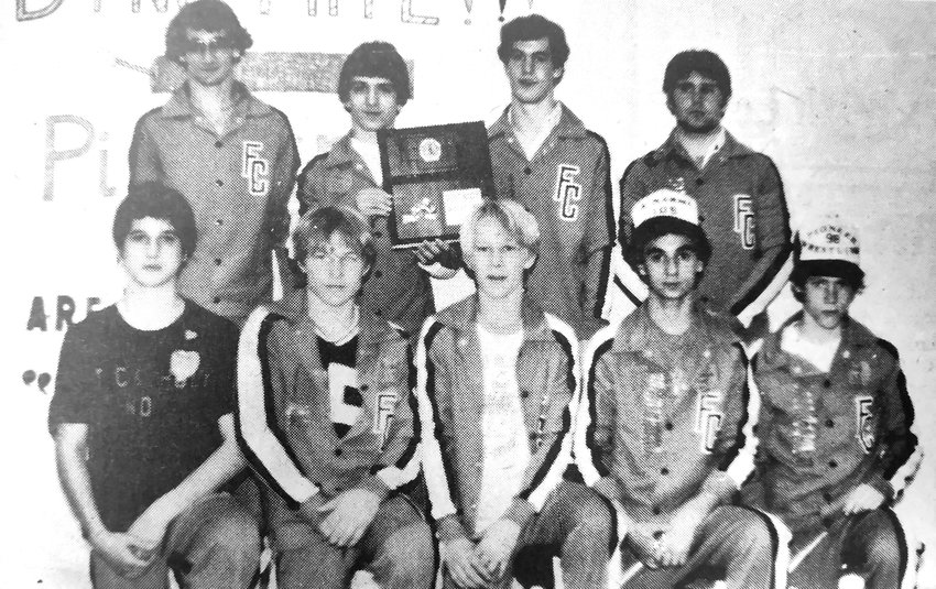 The Fort Calhoun wrestling team won its 1982 Class C2 District Tournament at home.