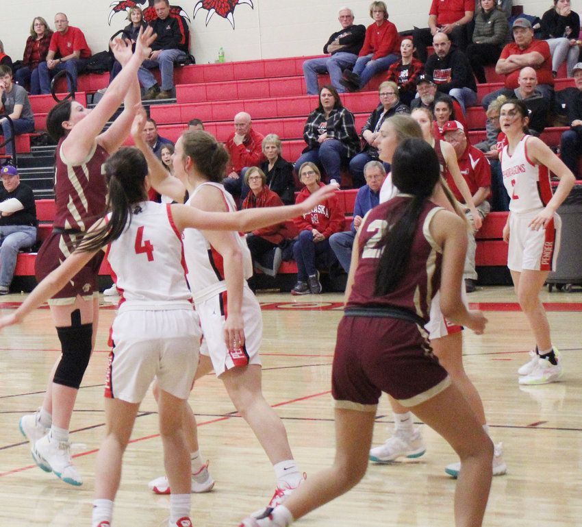 Bailey Tuttle scores one of her three baskets against Pender.