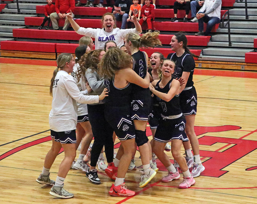The Blair girls basketball team celebrates Sophia Wrich's game-winning 3-pointer Tuesday at Elkhorn High School.