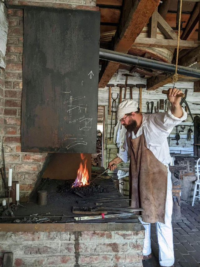 Thomas Bansen volunteers at Living History at Fort Atkinson, where he does demonstrations in the blacksmith quarters.