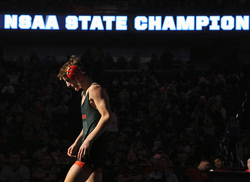 Fort Calhoun senior Ely Olberding wrestled Saturday in Omaha to become a two-time NSAA State Champion &mdash; as spelled out on the CHI Health Center ribbon board during introductions &mdash; but finished second at 138 pounds.