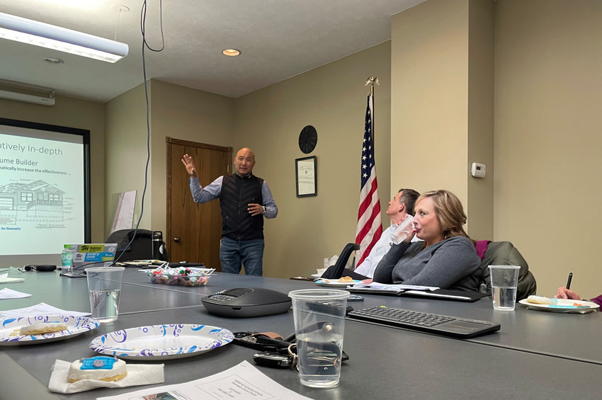 Ken Mar, area county director for Habitat for Humanity of Omaha's Washington County chapter, speaks to guest during a Washington County Chamber of Commerce Lunch and Learn Feb. 23.