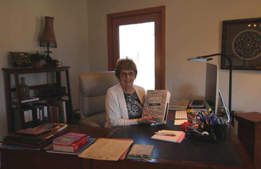 Donna Henton, local author, displays her latest book, &quot;If These Houses Could Talk,&quot; set to release March 11. The book is the third volume in a series of historical non-fiction books exploring the Blair's history.