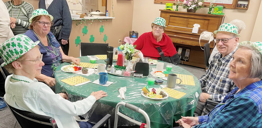 (left to right) Bev, Michele, Linda, Jack, and Doris wear green and ate green for the St. Paddy's Day holiday, while they played bingo. All the green made for a lack of pinching.