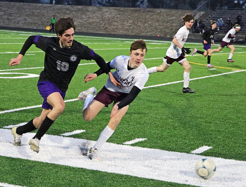 Blair midfielder Sergio Dominguez, left, chases the ball down against Waverly on Tuesday at Krantz Field.