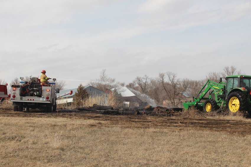 Members of the Arlington, Blair and Herman volunteer fire departments battled a fire at a property on County Road P10 in Herman on Thursday.