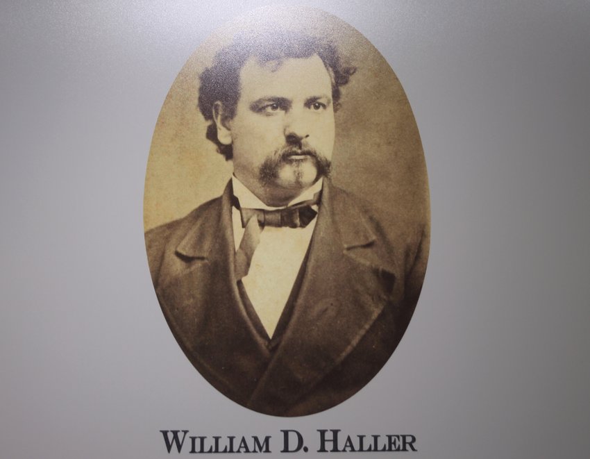 A photo of W.D. Haller looks over the Haller exhibit at the Washington County Museum in Fort Calhoun.