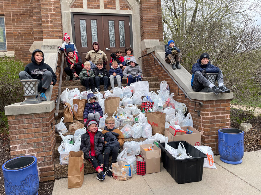 The last two Saturdays, the Cub Scouts and Boy Scouts of Arlington have been hard at work collecting food for the Washington County Food Pantry at Joseph's Coat.