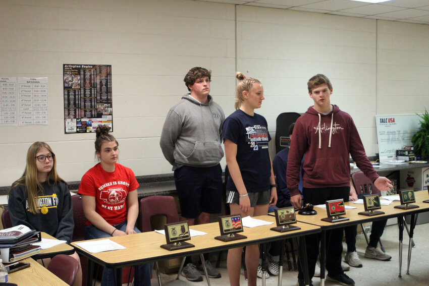 Arlington FFA members practice their speeches for the upcoming banquet Monday evening.