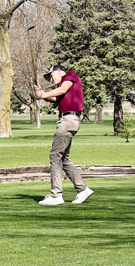 Eyan Tuttle taking his swing at the Oakland-Craig invite