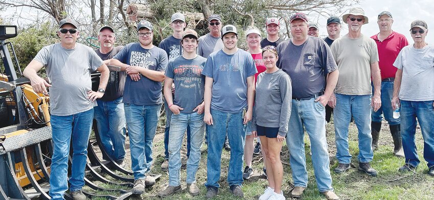 So many people came out to help clean up efforts the next day. The Krutileks were among those hit with Friday's tornado. Helping them with cleanup were: (back from left) Walker-Milford, Matt Walker-Milford, Jeff Wegner-Howells, Michelle Walker-Milford, Brandon Bailiff-Grimes IA, Keri Bailiff-Grimes IA, Brad Bailiff-Grimes IA, and Jay Peterson-Lyons, (front from left) Ed Fredricksen-Oakland, Jakob Krutilek-Oakland, Dylan Swensen-Uehling, Jared Krutilek-Tekamah, Amy and Scott Krutilek-Oakland, Mike McKenzie-Lyons, and Charlie Krutilek-Decatur.Dylan Swensen-Uehling; Jared Krutilek-Tekamah; Amy and Scott Krutilek-Oakland; Mike McKenzie-Lyons, and Charlie Krutilek-Decatur.