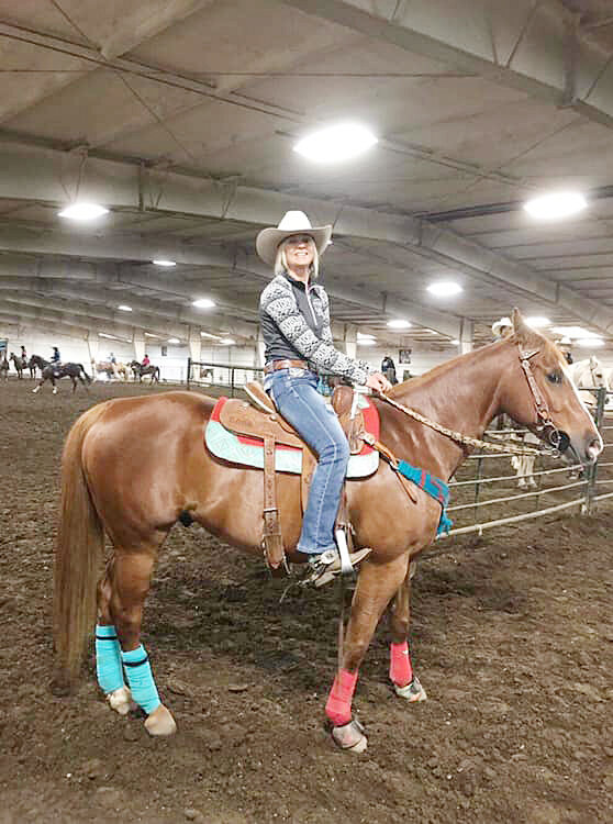Katie Mace and her favorite horse Bruno right before running at a barrel competition in Huron, South Dakota.
