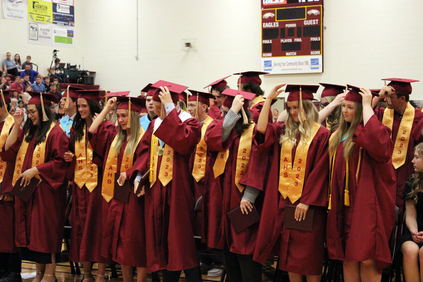 Eagle graduates turn their tassels at the conclusion of the commencement ceremony.