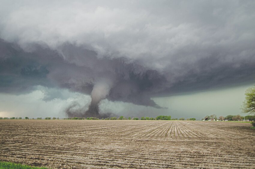 Omaha diesel mechanic Cody Seeley has been chasing storms for about 20 years.  He captured this tornado just northeast of North Bend, Nebraska.  The same cell that spawned this EF 2 also spawned several others including the one narrowly missing Hooper, Uehling, Oakland, and Lyons.  This photo is available for purchase at codseeley.smugmug.com.