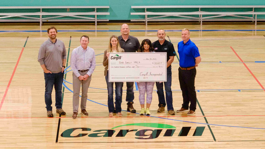 Cargill donated $100,000 to the Blair Family YMCA as part of its annual giving week. From left: JB Scherpelz, Pete Stoddart, Maggie Smith, Aaron Matson, Sandy Christiansen, Jason Christiansen and Brandon Palmer.