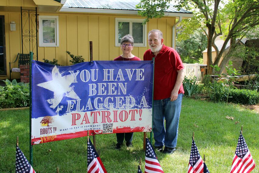 Gloria and Dave Lamm were the fourth house to be &quot;flagged&quot; by Roots to Wings as part of a fundraiser through Labor Day.