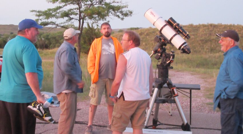 Amateur astronomers at the Nebraska Star Party south of Valentine prepare their telescope for viewing the universe from dusk to dawn.