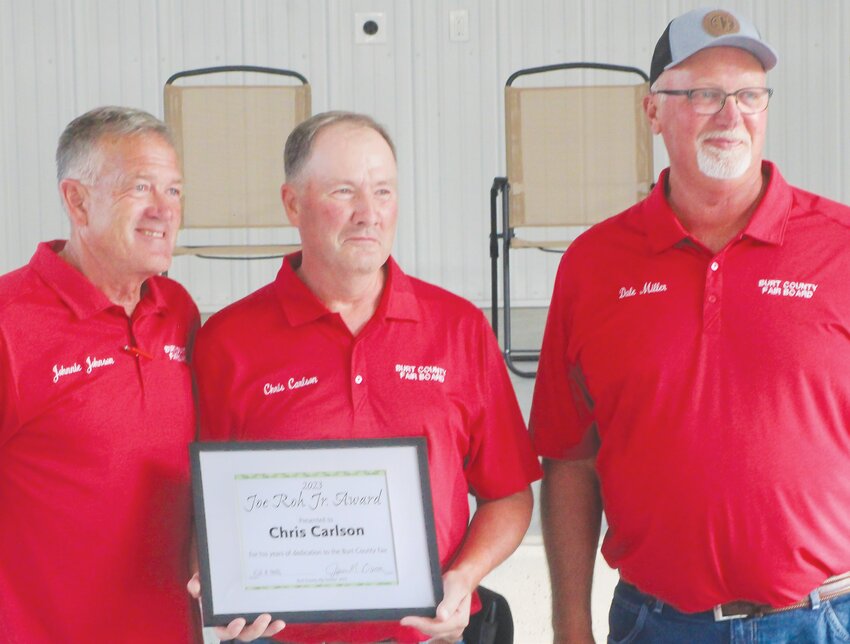 Johnnie Johnson (left) and Dale Miller (right), Burt County Fair Boardmembers, were pleased to award Christ Carlson of Tekamah the 2023 Joe Roh, Jr. Distinguished Service Award for his decades of dedication to the Burt County Fair.