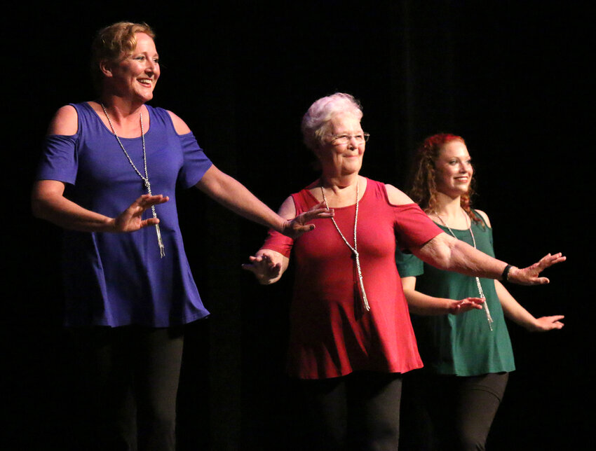 From left, Blair Dance Center Director Jill Sailors dances with her mother, BDC founder Judy Howard, and her daughter, Annaliese Sailors, in 2018 during the center's 40th anniversary dance recital.