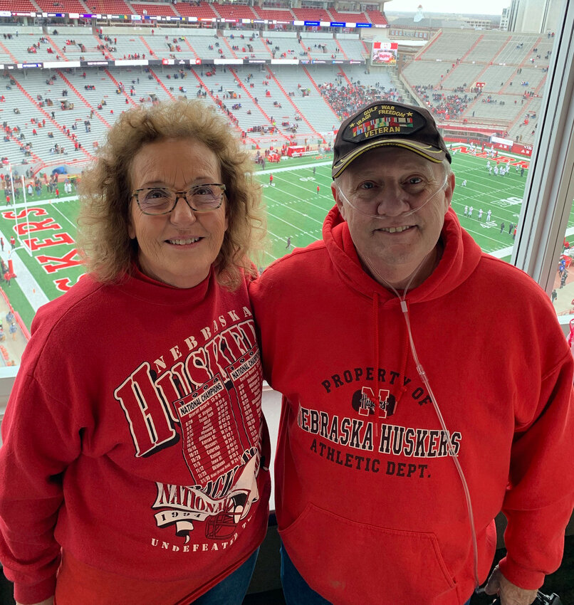 Sheryl and Gary Denison attended a Nebraska Husker game and sat in a skybox, which was a bucket list for Gary, a huge Husker fan.