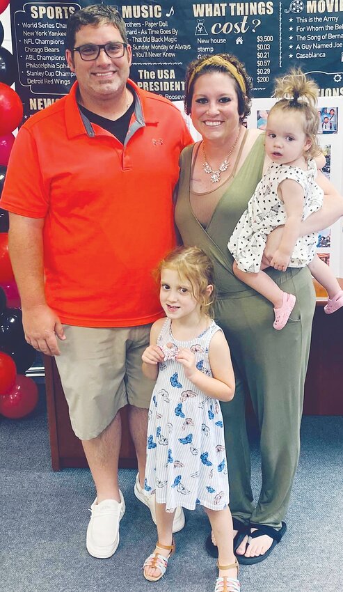 Cody and Abi Coonrod with their daughters Preslee (in her mother