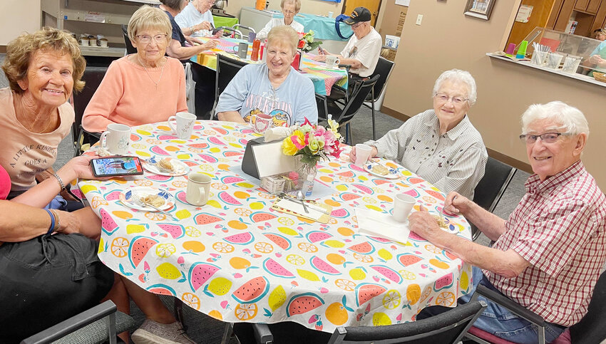(left to right) Betty Brehmer, Mary Goff, Mary Strohmyer, Laurene &amp; Richard Appleby enjoyed coffee treats at the Happy Days Senior Center.