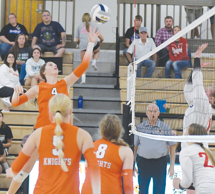Sometimes a gentle touch can throw off the defenders at the net as Briary Ray demonstrates against the Lady Bulldogs.