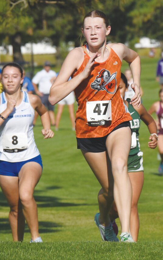 Carolyn Magnusson medals in 13th with 22:41 in North Bend.