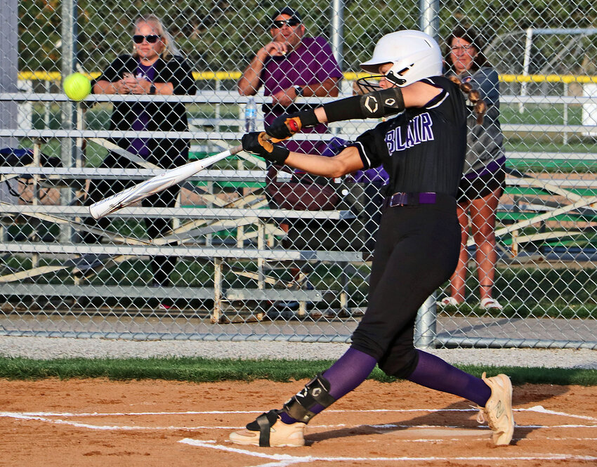 Bears senior Nessa McMillen hits a first-inning home run Tuesday against Lincoln Northwest at the Blair Youth Sports Complex.