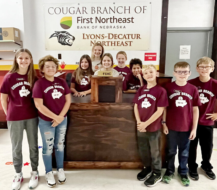 The tellers for the 2023-2024 Cougar Branch of First Northeast Bank of Nebraska. (Left to Right) Kennedy Petersen, Mia Santifer, Meika Maryott, Charlotte Dolezal, Delaney Andersen, Jenaveev Myers, Jhosse Sadoval, Paxton Lane, Connor Vacha, Liam Carr