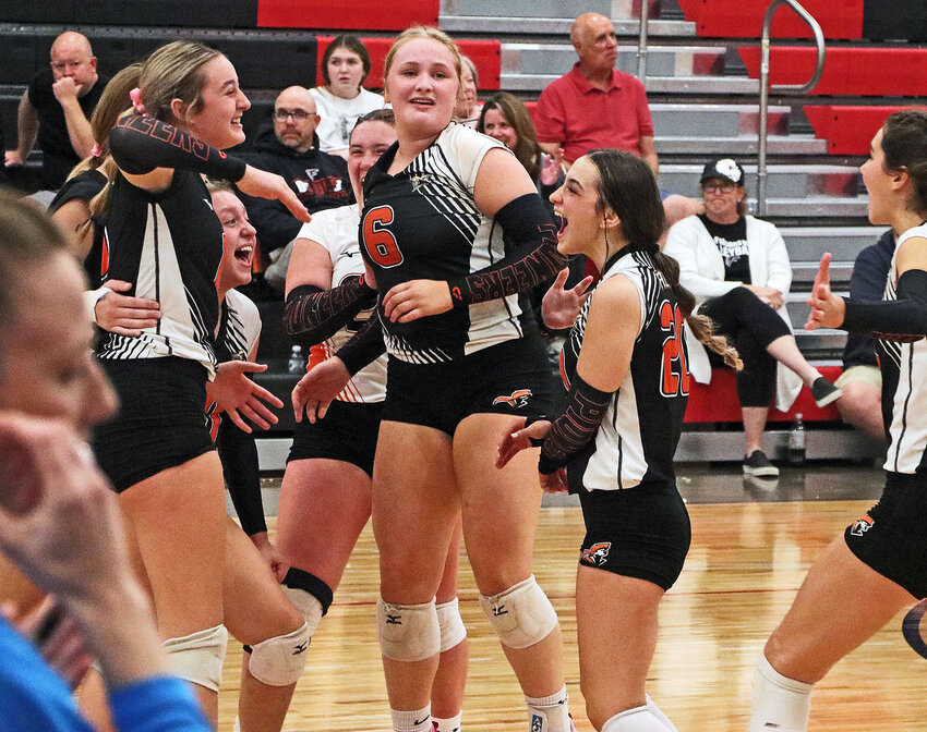 The Fort Calhoun Pioneers celebrate one more set victory Monday against the top-seeded Falcons at Douglas County West High School. FCHS finished Class C1-3 Subdistrict Tournament 1-1 overall.