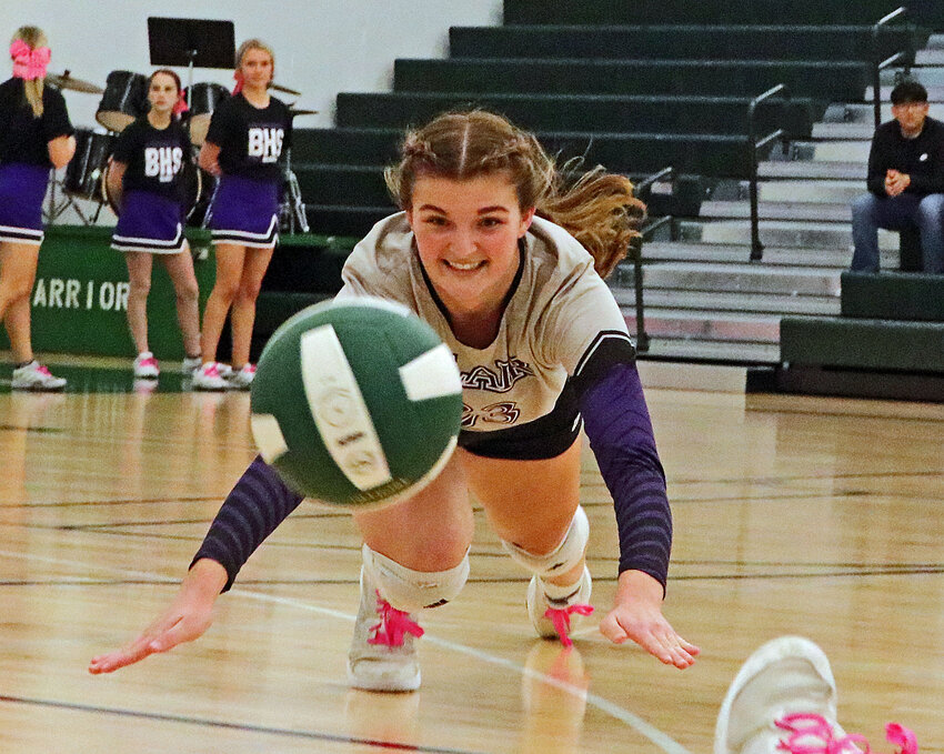 Blair junior Taylor Mostek lunges for a ball about to hit the floor Tuesday during the Class B-4 Subdistrict Tournament at Schuyler Central High School.