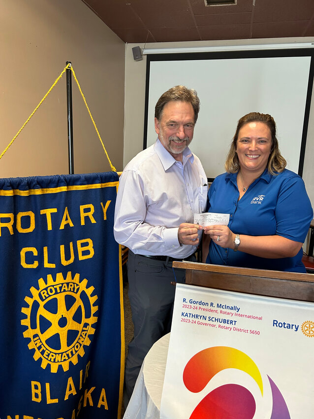 Paul Swanson of the Blair Rotary Club (EMG's director of sales) and Cindy Slykhuis of the Fremont Area United Way pictured at last Tuesday's Rotary meeting. Slykhuis presented on the Imagination Library, which was expanded to Washington County in July.