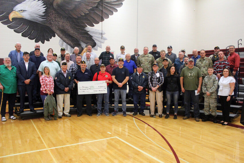Pictured is a group of service members during last year's Arlington Public Schools' Veterans Day ceremony.