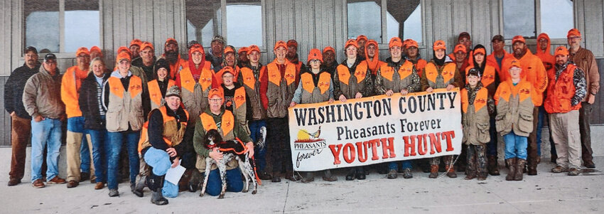 Washington County Pheasants Forever Mentored Youth Pheasant Hunt participants pose for a photo Oct. 14 at the Blair Youth Shooting Sports range.