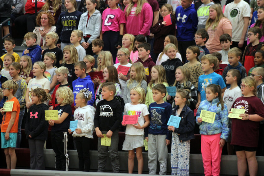 The Arlington Elementary students sing &quot;The Brave&quot; by John Riggio Wednesday during the Veterans Day ceremony.