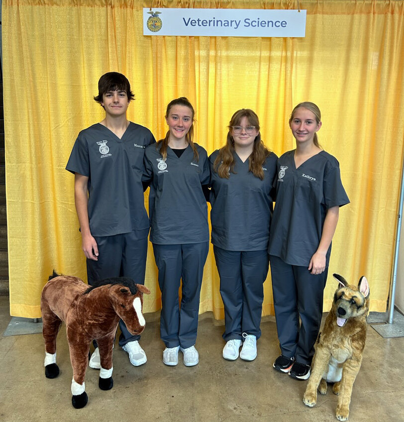 From left, Blair High School FFA Vet Science team Mason Stoddard, Somer Schultz, Katelyn Mitchell and Kathryn Picton on day one of the National FFA Competition. The competition took place at the Indiana State Fair Grounds, where the group placed fourth in their category.