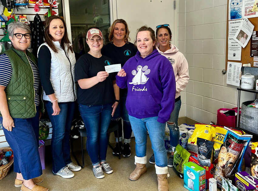 Following the Arlington Mom Prom earlier this month, the group provided a $4,000 check donation to the Jeanette Hunt - Blair Animal Shelter, as well as numerous supplies, on Tuesday. Pictured from left, Cheryl Stevens, Jenny Eriksen, Heather Fastenau, Laurel Lang, Rachel Preissler and Mandi Lang.