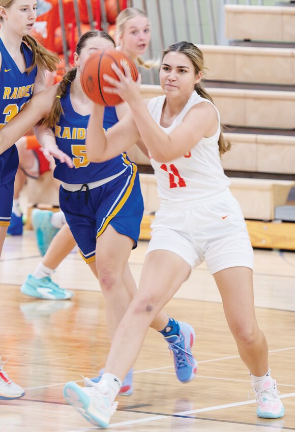 Receiving the pass, Val Lierman keeps the ball moving against Logan View.