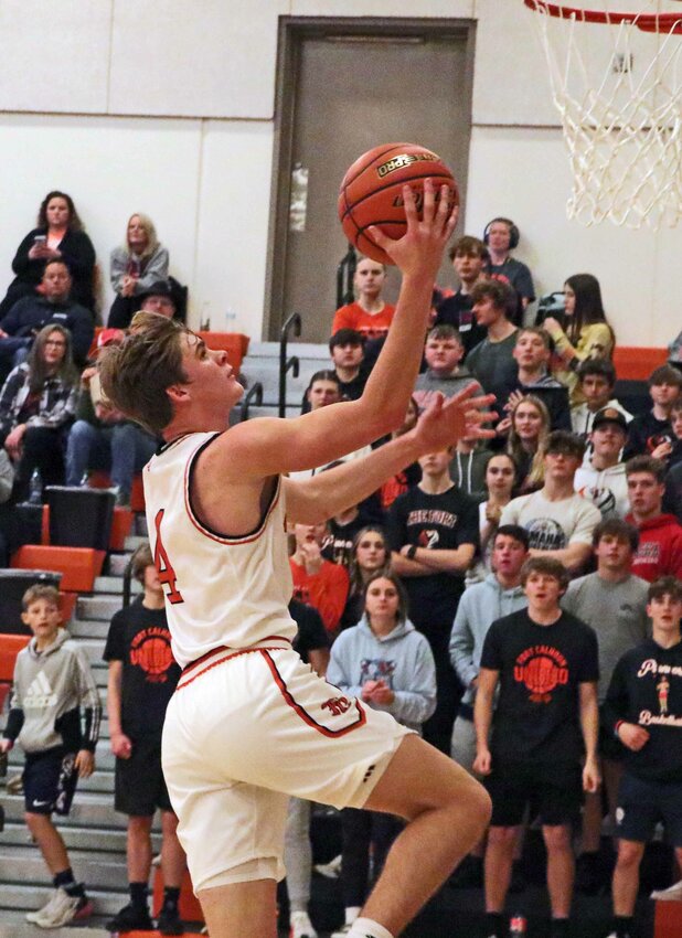 The Pioneers' Grayson Bouwman goes up for a layup Thursday at Fort Calhoun High School.