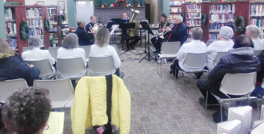 Community members enjoyed the Christmas concert performed by Ne-Brass-Ka Brass Quintet at the Lyons Public Library.