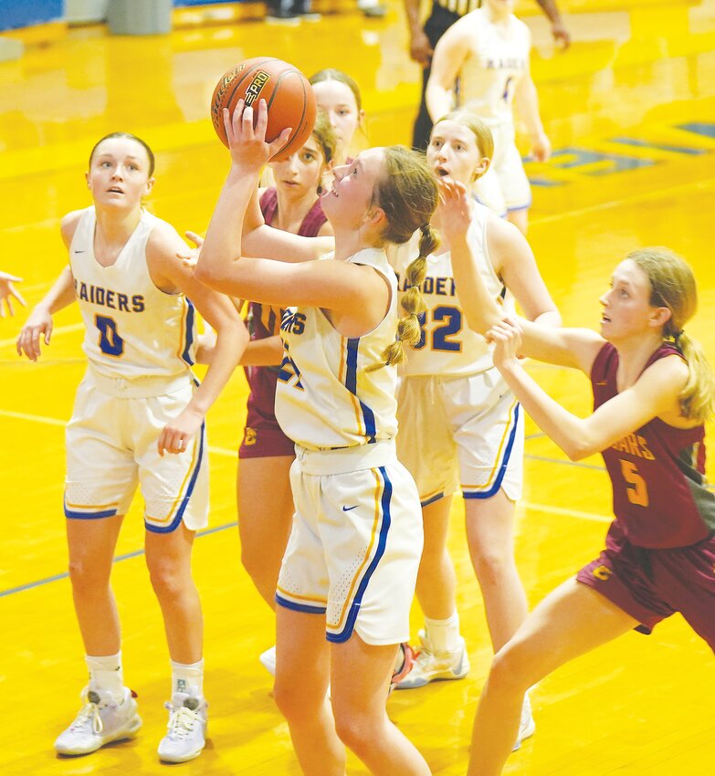 Haley Isaac #21 gets the rebound and puts it back up for two in the win over Conestoga.