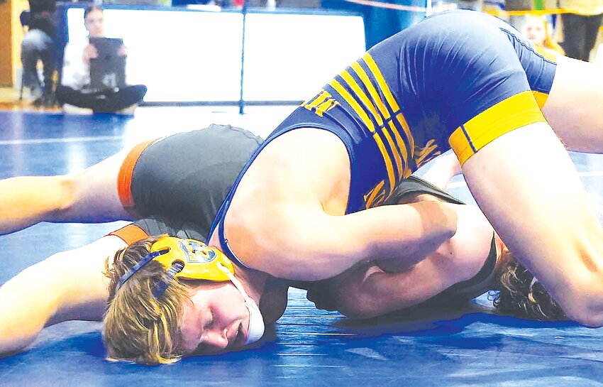 Owen Meyer works for the pin in the first round at 150 lbs at the Logan View Invite.  Owen went 2-2 at the tournament.