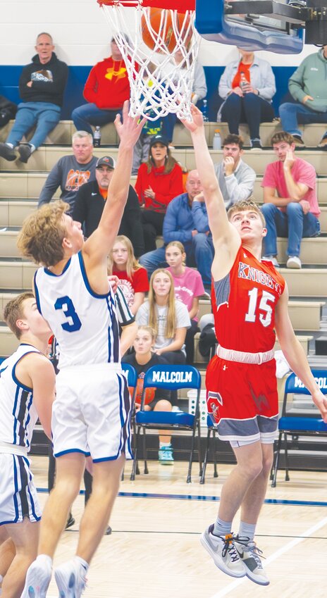 Dawson Meyer goes up for a layup against the Malcolm Clippers.