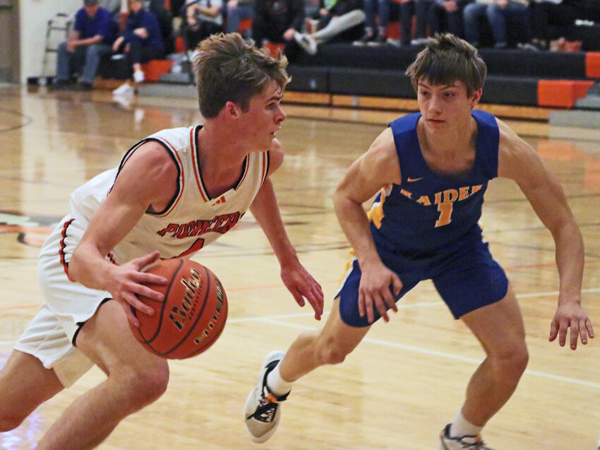 Fort Calhoun senior Grayson Bouwman, left, Washington County's leading scorer, and his Pioneers had a Tuesday evening game postponed by winter storm school cancellations.