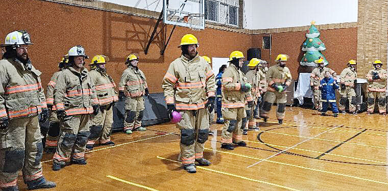 Nothing Is more intimidating than a line of firefighters holding a dodgeball waiting to attack.