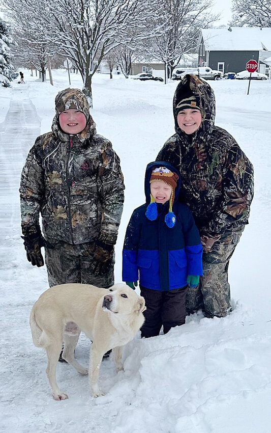 Hunter, Greyson, and Jaylynn Simonsen took full advantage of the snow day.